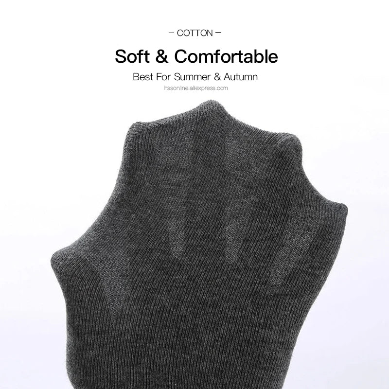 A close-up view of a gray cotton sleeve or garment, likely a no-show sock.