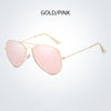 Gold/pink polarized pilot sunglasses with thin metal arms and pink tinted lenses
