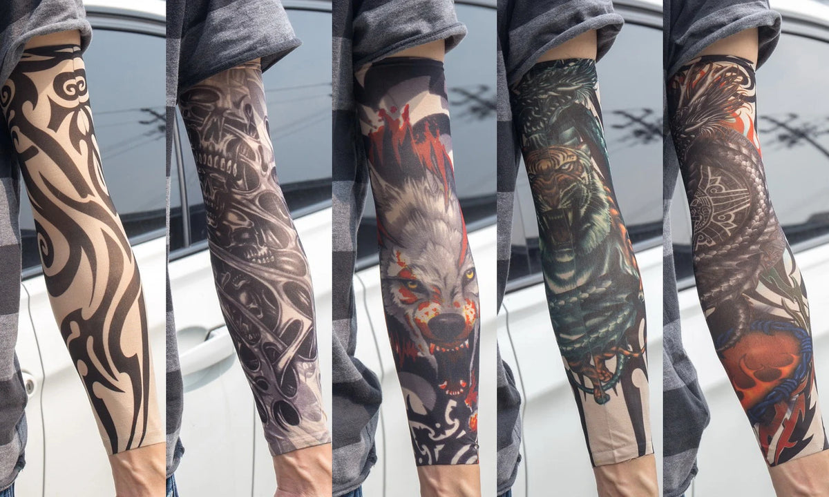 A close-up of a person wearing dark gray reusable UV protection tattoo arm sleeves featuring intricate black and orange triba