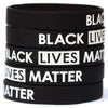 Stack of black silicone wristbands with white text reading Black Lives Matter