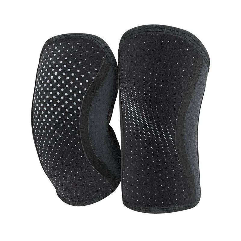 Unes bandeaux de genou noirs à motifs pointillés pour musculation et CrossFit.