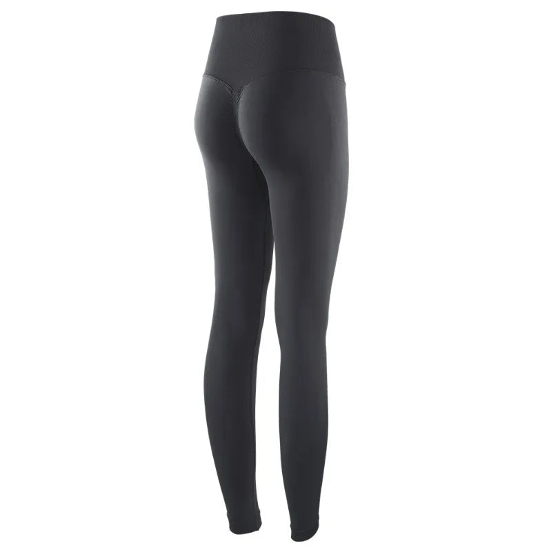 Black high-waist seamless yoga leggings shown from the side.