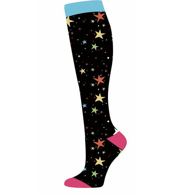 Black compression socks with a light blue cuff and colorful star patterns.