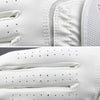Close-up of white microfiber golf grips showing stitching and textured surfaces for enhanced sports performance.