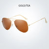 Gold/tea tinted pilot sunglasses with thin gold metal frames