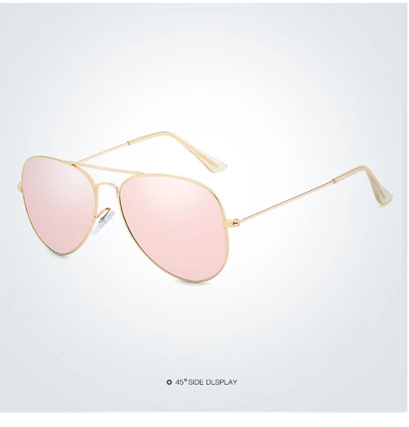 Pink polarized pilot sunglasses with gold-toned metal frames shown against a white background.