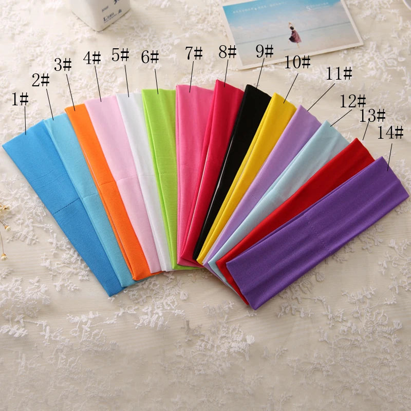 A collection of multi-use elastic headbands in various colors, numbered 1 through 14, laid out on a white surface.