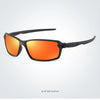Orange-tinted sports sunglasses with black frames shown against a white background.