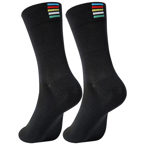 A pair of black performance cycling and sports socks shown standing upright.