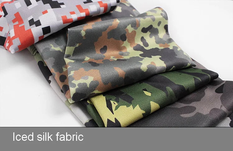 A stack of iced silk fabric in various camouflage patterns, including orange and black, olive green, and gray.
