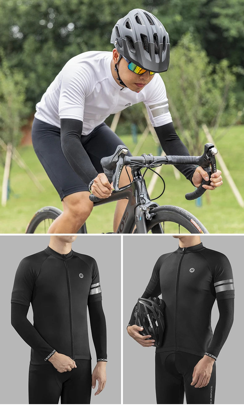 A man wearing black cycling arm sleeves and a helmet is riding a bicycle outdoors.