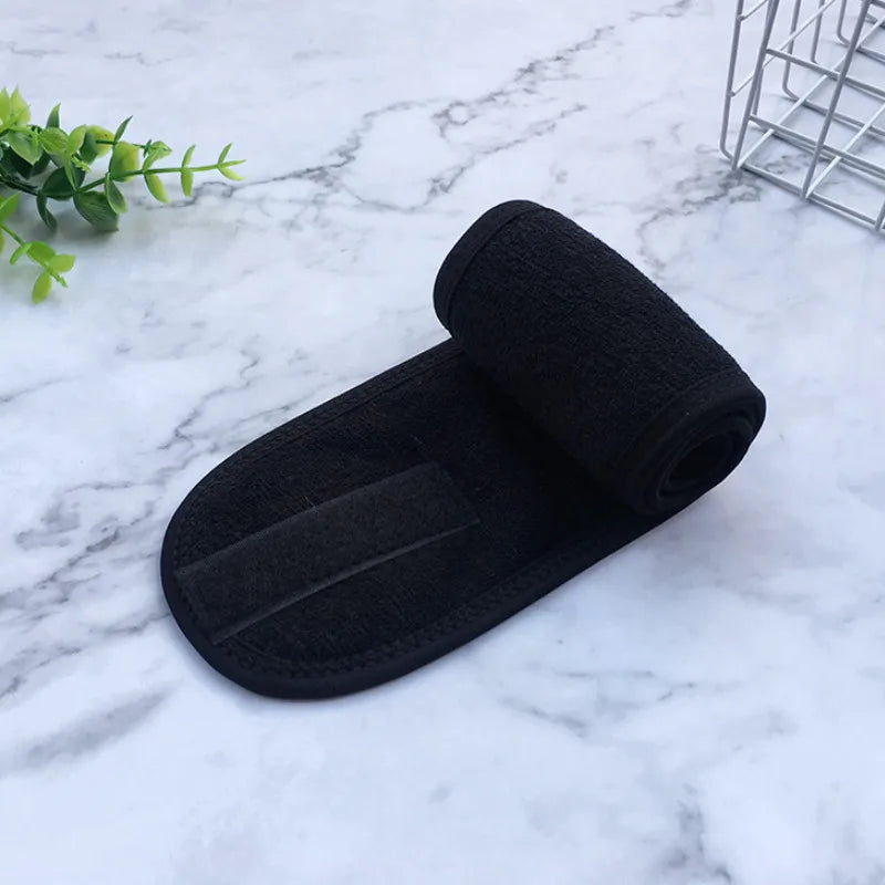 Black adjustable wide headband for hair makeup and spa