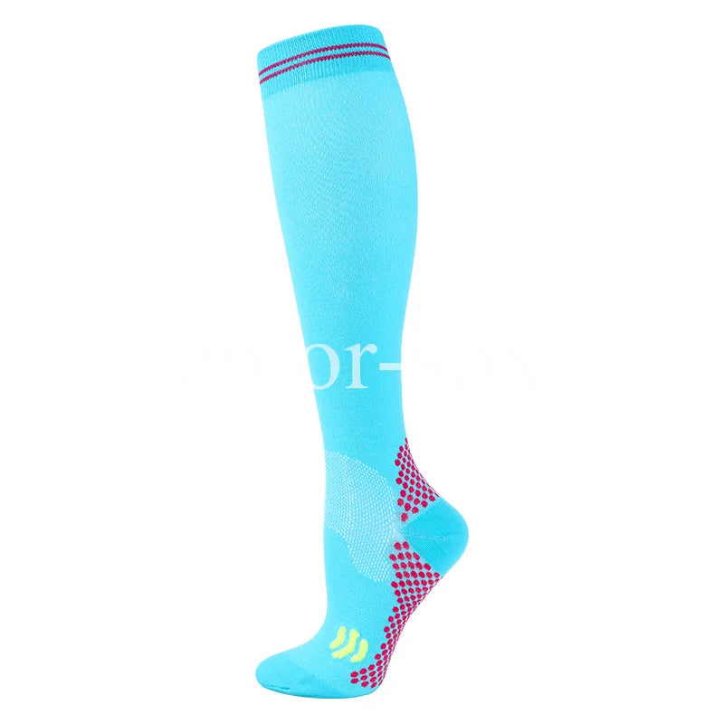 A bright blue graduated compression sock with red accents, shown vertically.