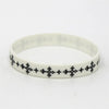 White silicone cross wristband with black etched crosses for sports and fashion
