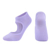 A pair of lavender breathable women's Pilates and yoga socks, shown from the side.