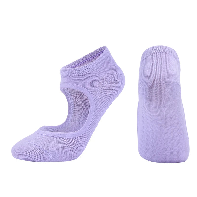 A pair of lavender breathable women's Pilates and yoga socks, shown from the side.