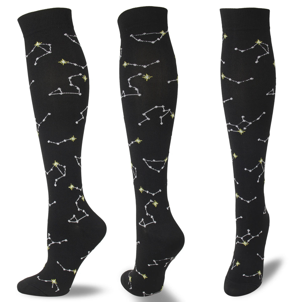 Black compression socks featuring a pattern of gold and white star constellations