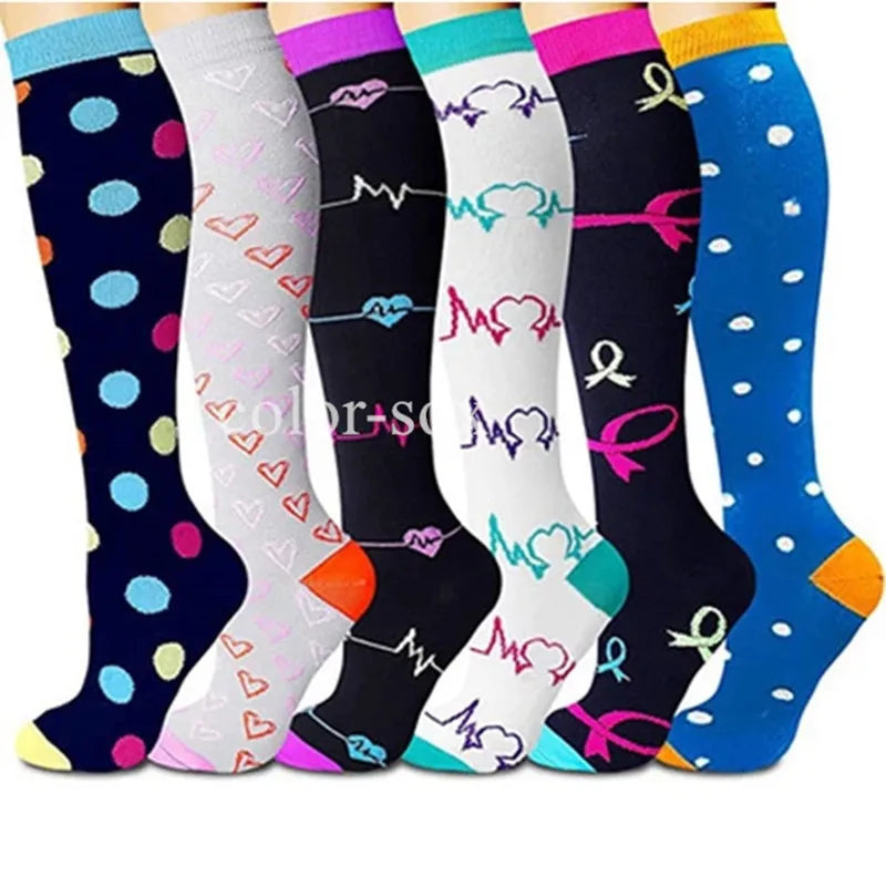A row of multi-color compression socks featuring various heart and medical symbols.