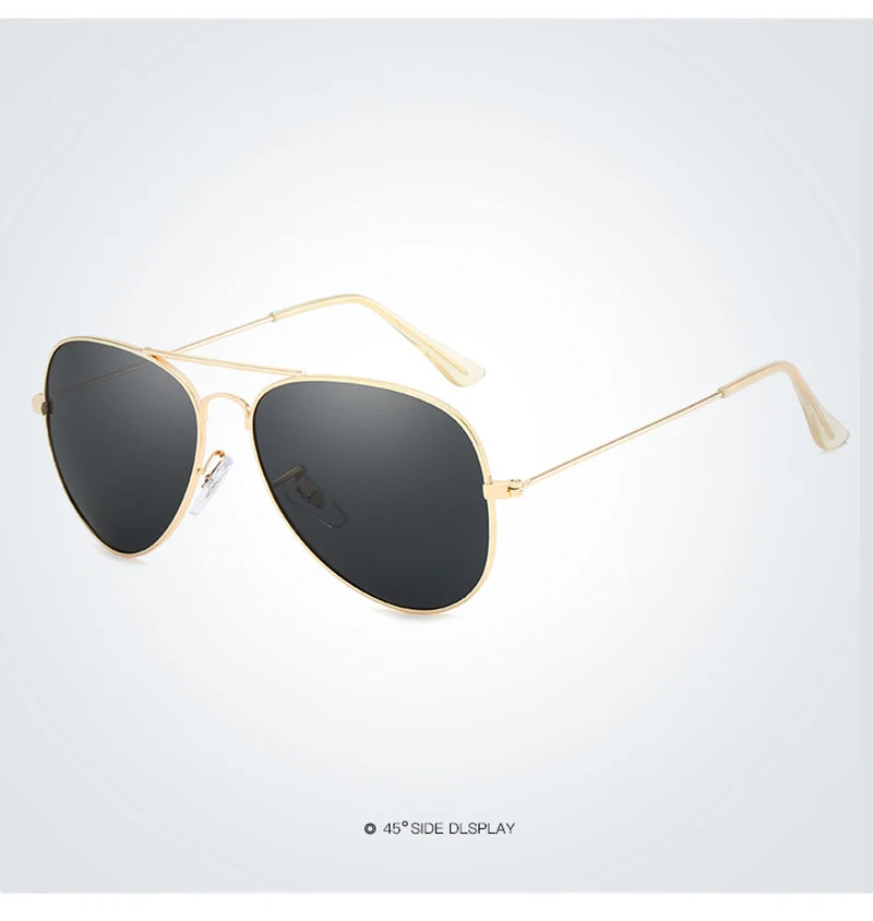 Gold-framed aviator sunglasses with dark lenses shown in a studio setting.