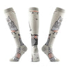 A set of multi-color compression socks featuring owl designs on a light gray background.