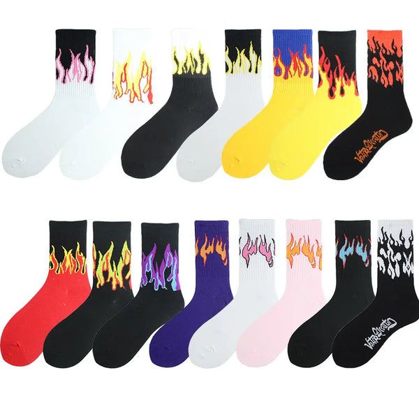A collection of women's crew socks featuring various flame patterns in colors like black, white, yellow, pink, and purple.