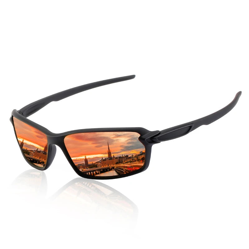 A pair of black polarized sports sunglasses with orange-tinted lenses reflecting a city skyline at sunset.