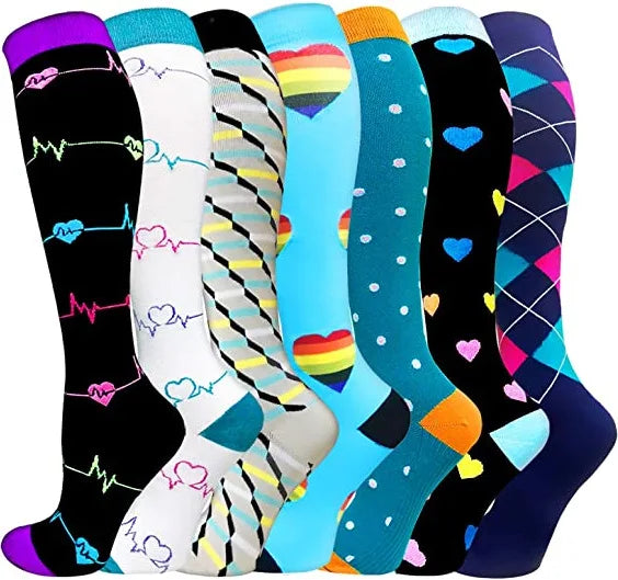 A collection of colorful compression elastic socks featuring various patterns and heart designs.