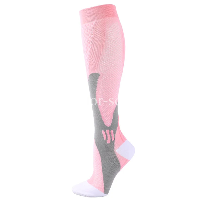 A pair of pink and gray graduated compression socks for sports and recovery.