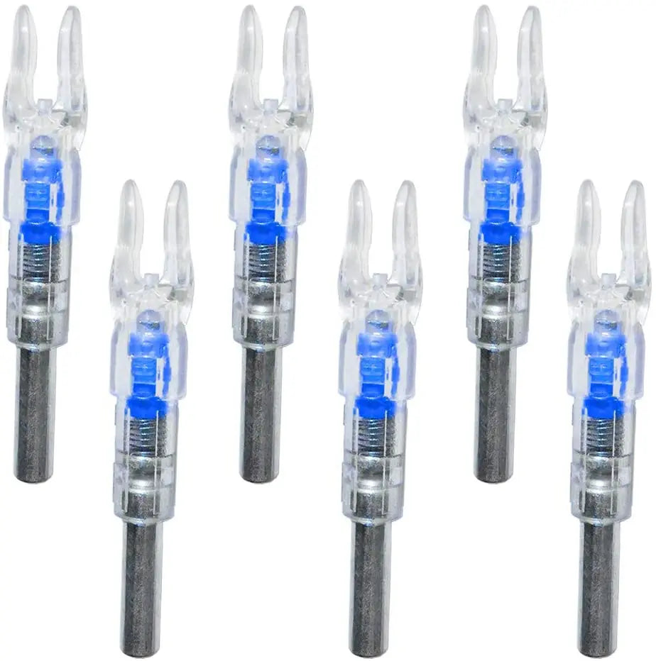 A set of five lighted arrow nocks for archery, featuring clear plastic and metal components.