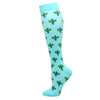 Light blue compression socks patterned with green cacti for circulation and vein support