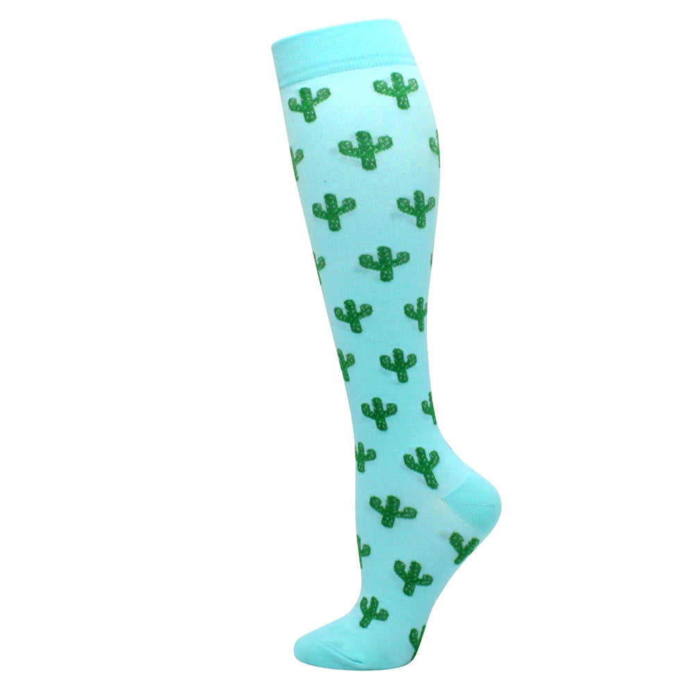 Light blue compression socks patterned with green cacti for circulation and vein support
