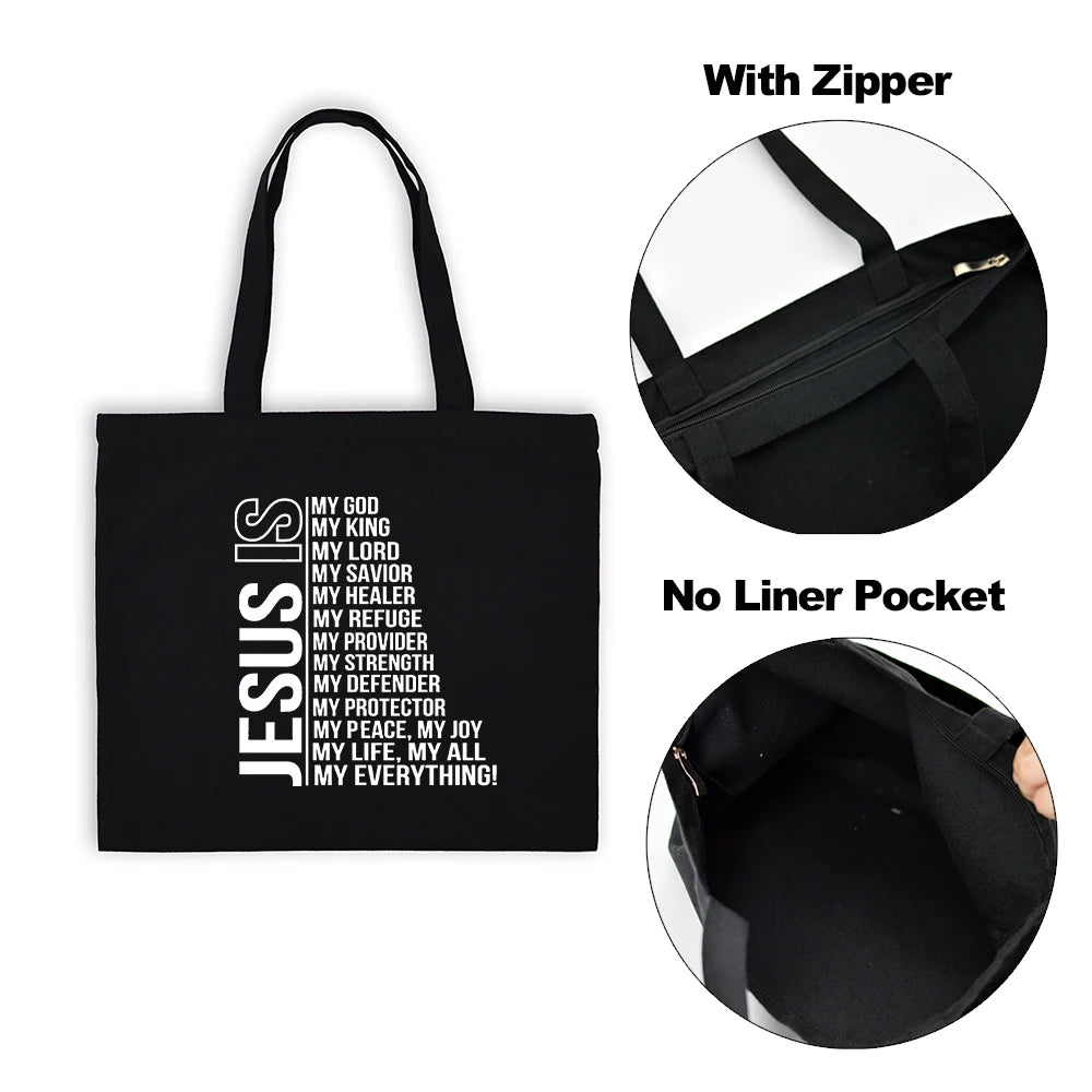 Black canvas tote bag with a white text print of Jesus affirmations and a zipper detail.