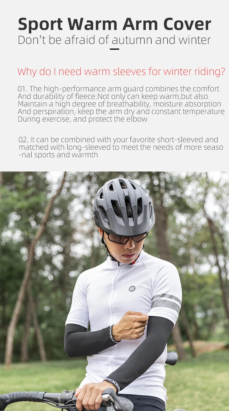 A person wearing a white cycling jersey and black arm sleeves is shown outdoors, possibly riding a bicycle.