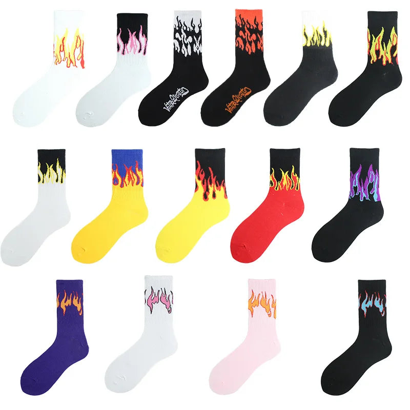 A collection of women's crew socks featuring various flame patterns in colors like white, black, yellow, red, and purple.