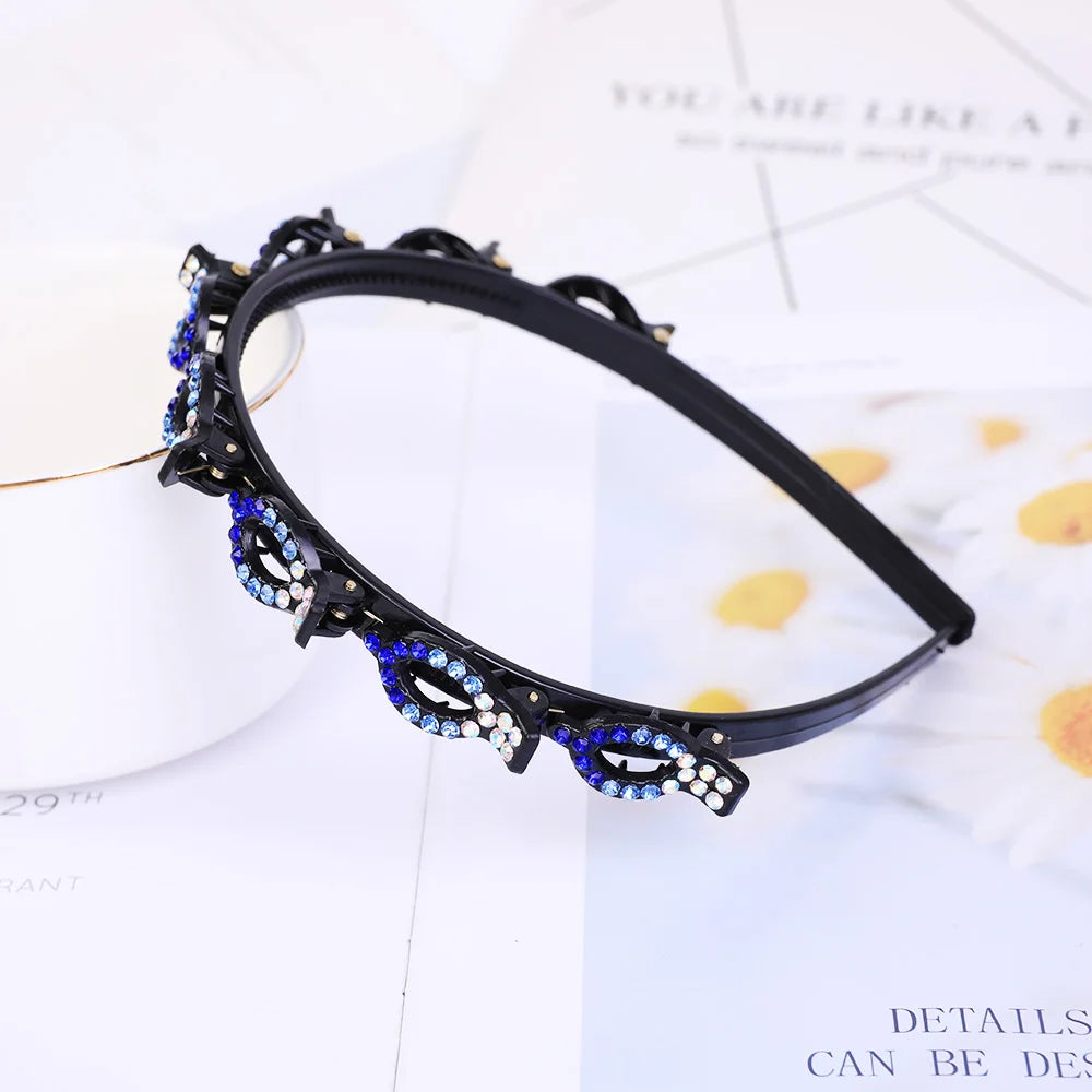 Black headband adorned with blue and clear rhinestones and pearls