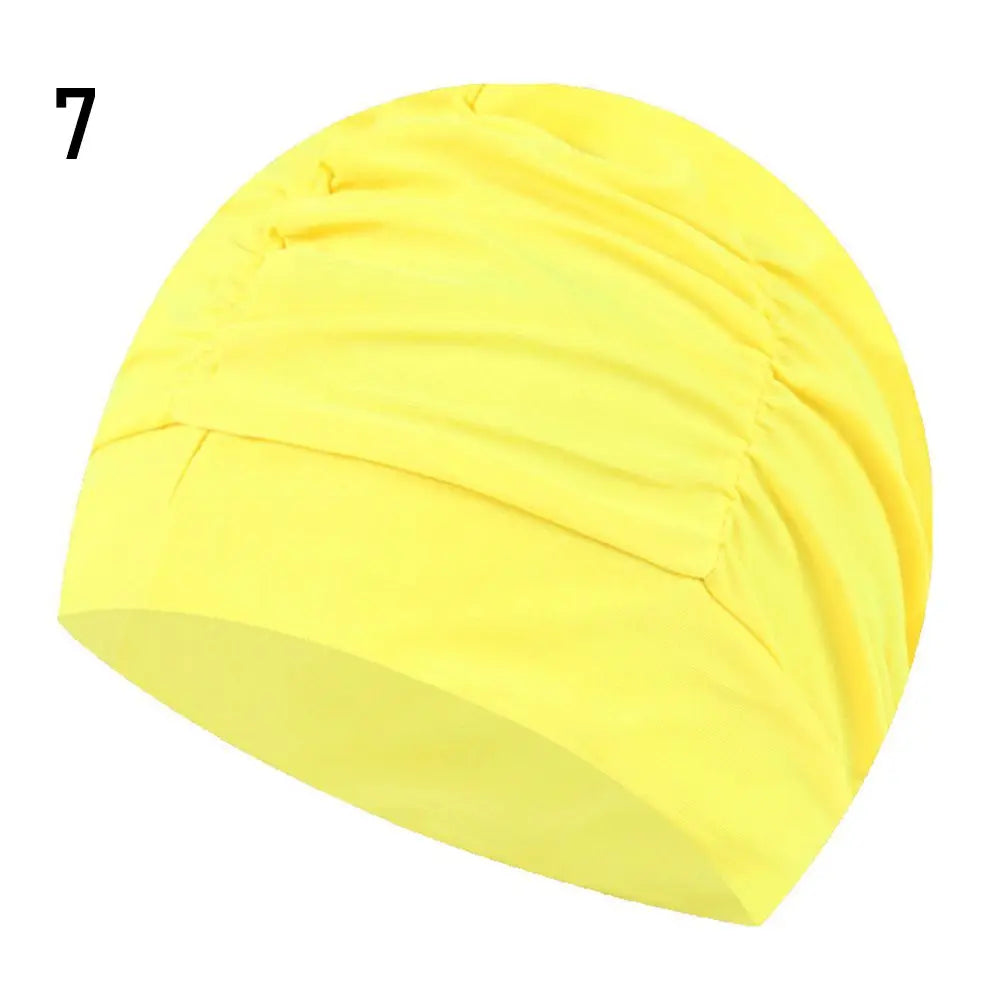 Yellow elastic nylon turban swimming cap shown from the side.