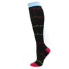 Black compression socks with colored ECG-like lines and a blue cuff.