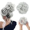 Silver messy curly hair bun extensions styled in an updo