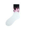 A pair of white crew socks with a black cuff featuring a pink flame pattern.