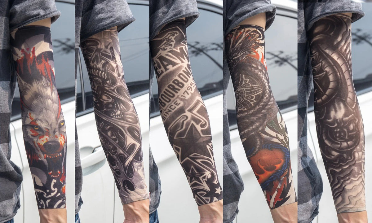Close-up of a person wearing dark gray UV protection tattoo arm sleeves featuring intricate tribal and animal designs on thei
