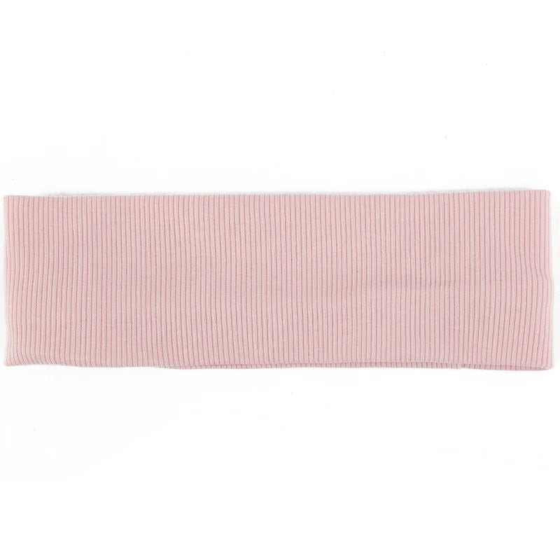Diadema de algodón tejido rosa para el cabello.