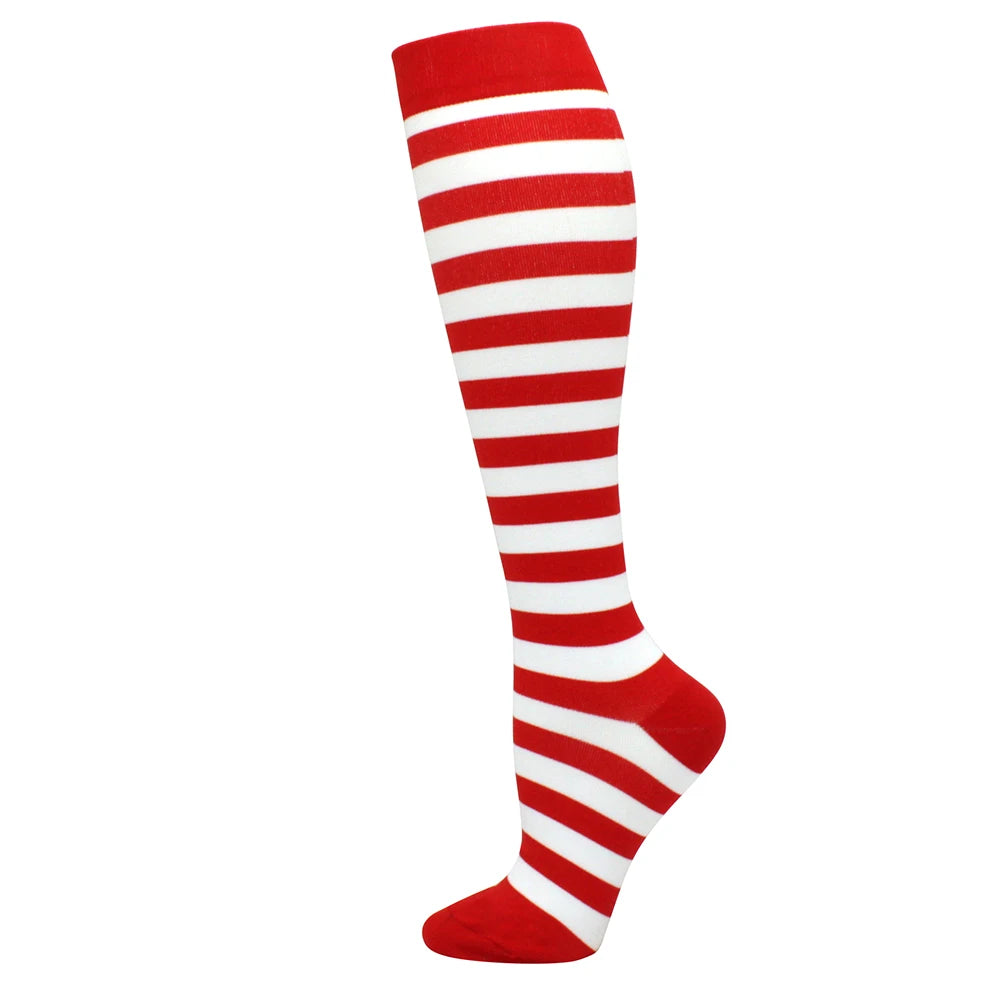 A pair of red and white striped medical grade compression socks for circulation and vein support.
