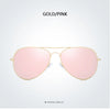 Gold/pink polarized pilot sunglasses with light pink lenses and gold frames