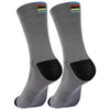 A pair of grey performance cycling and sports socks with colored stripes at the top.