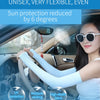 A woman wearing white fingerless arm sleeves for sun protection inside a car.