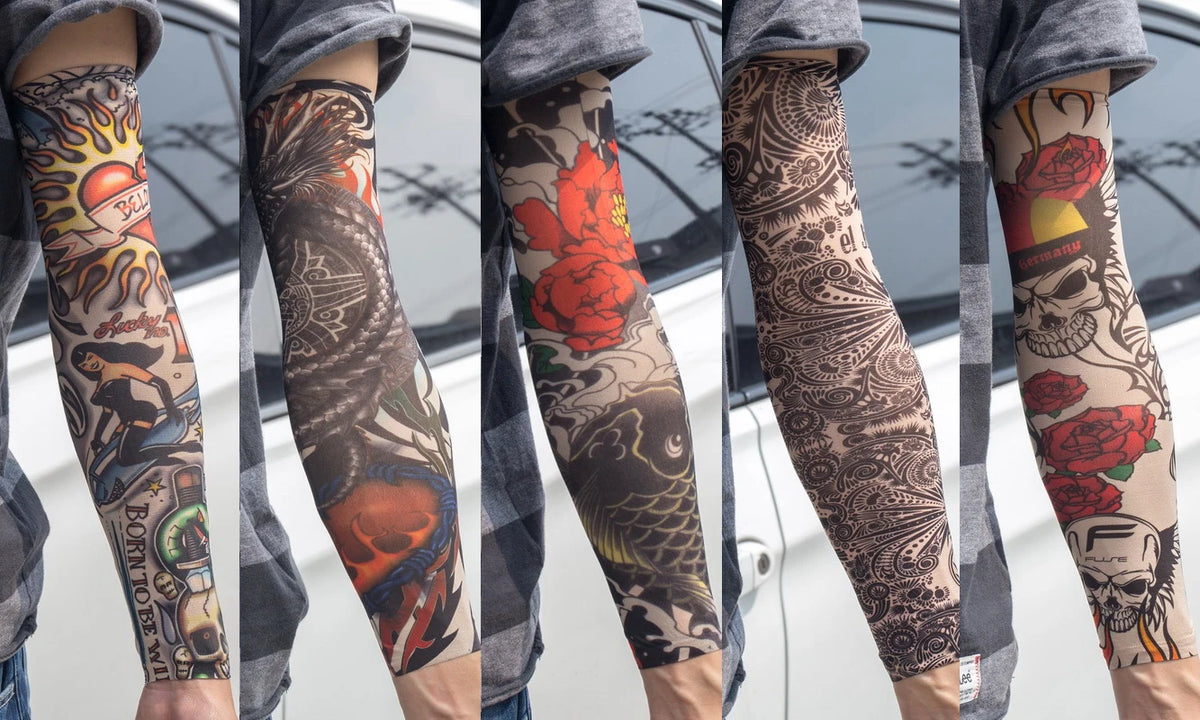 A close-up of a person wearing colorful, detailed tattoo arm sleeves on their forearm.