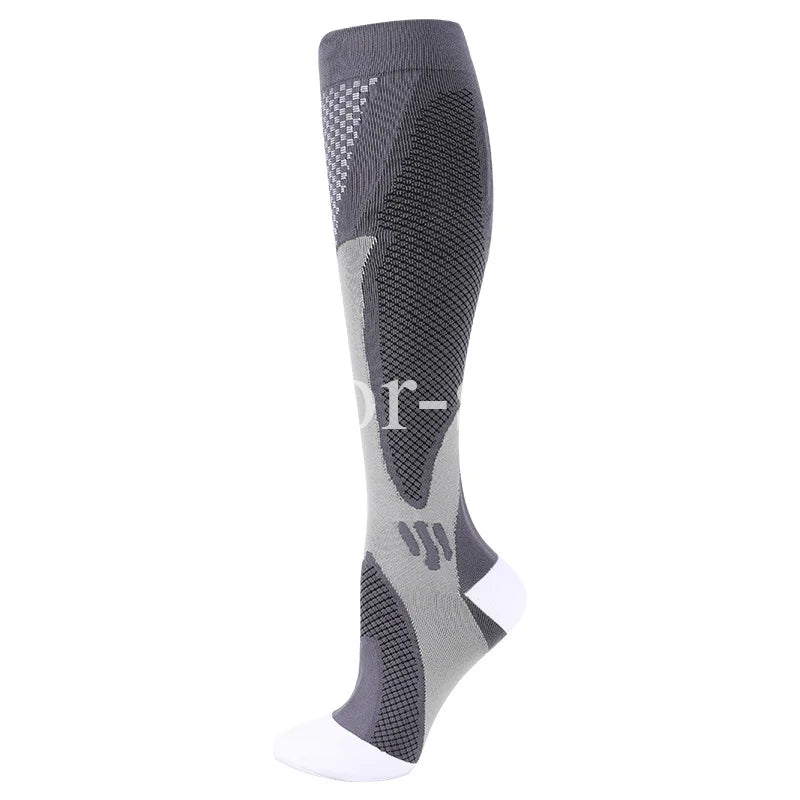A pair of gray graduated compression socks for sports and recovery