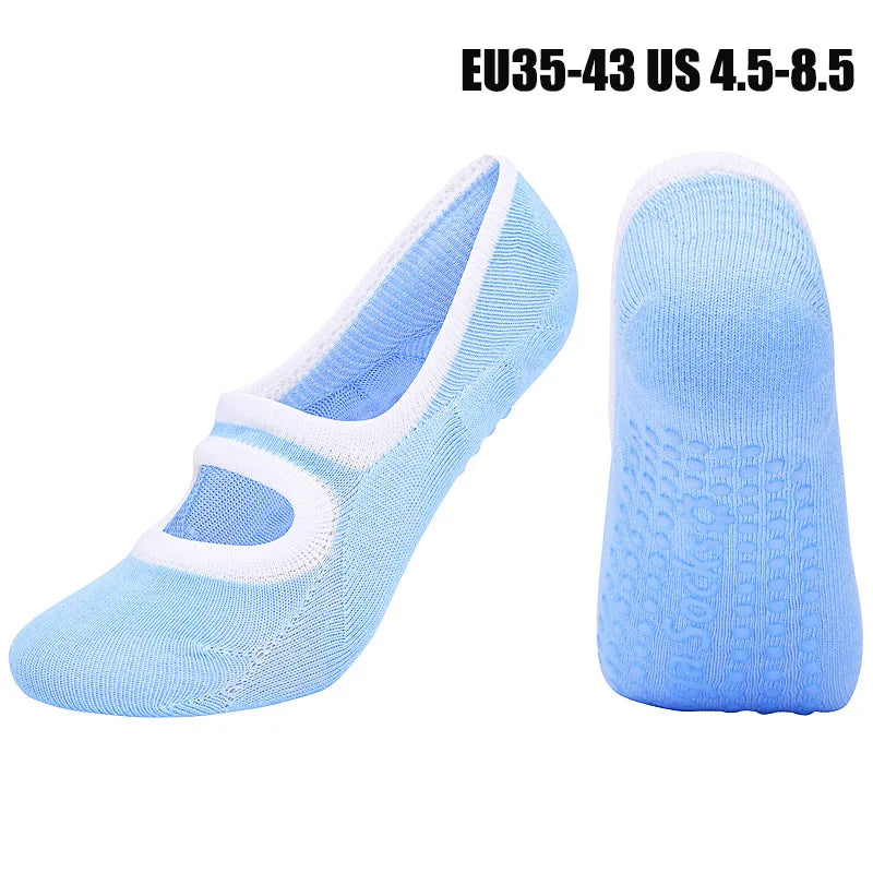 Pair of light blue breathable women's Pilates and yoga socks shown from the side.