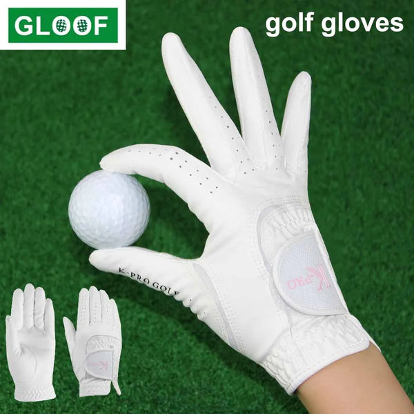 A white golf glove is shown with a golf ball and other gloves on a green surface.