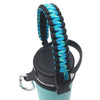 A black water bottle with a blue and black paracord strap attached.